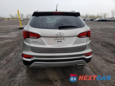 Zdjęcie 6 z 13 samochodu: 2018 HYUNDAI SANTA FE SPORT VIN:5XYZTDLB7JG510988 - miniatura