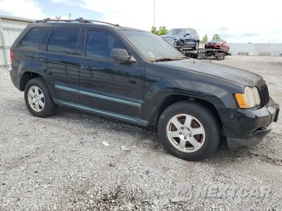 Czwarte zdjęcie samochodu z boku: 2008 JEEP GRAND CHEROKEE LAREDO VIN:1J8GR48K68C103069 - miniatura