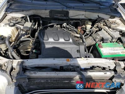 Zdjęcie 12 z 13 samochodu: 2002 FORD ESCAPE VIN:1FMYU03162KB99358 - miniatura