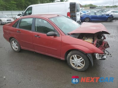 Czwarte zdjęcie samochodu z boku: 2002 FORD FOCUS SE VIN:1FAFP34P12W208201 - miniatura