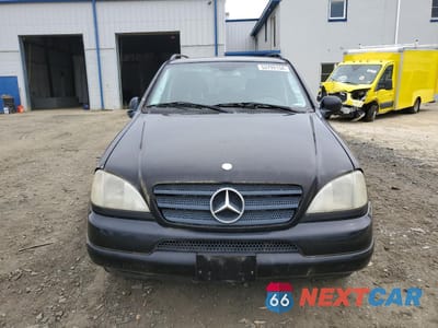 Piąte zdjęcie samochodu w środku: 2001 MERCEDES-BENZ ML 320 VIN:4JGAB54E71A233494 - miniatura