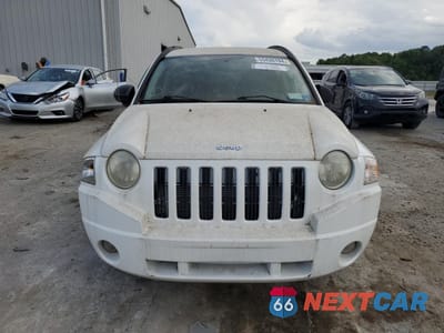 Piąte zdjęcie samochodu w środku: 2009 JEEP COMPASS SPORT VIN:1J8FF47B99D137380 - miniatura