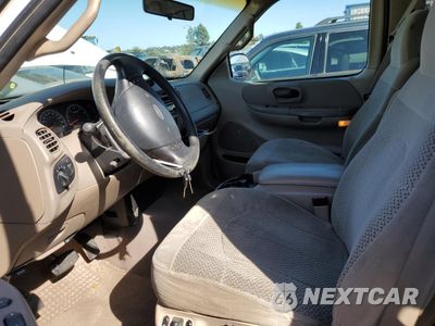 Zdjęcie 7 z 12 samochodu: 2000 FORD F150 VIN:1FTRX17W9YKA49152 - miniatura