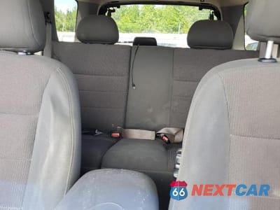 Zdjęcie 10 z 13 samochodu: 2002 FORD ESCAPE VIN:1FMYU03162KB99358 - miniatura