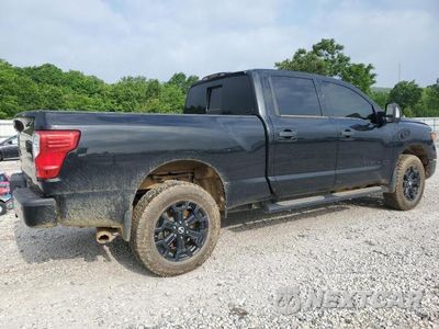 Trzecie zdjęcie samochodu z tyłu: 2019 NISSAN TITAN XD SL VIN:1N6BA1F4XKN534423 - miniatura