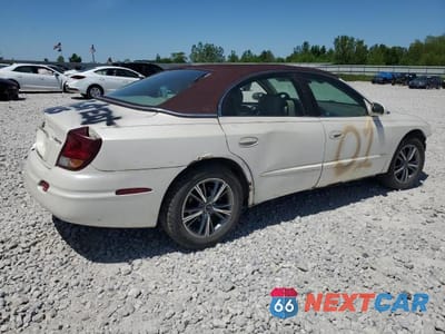 Trzecie zdjęcie samochodu z tyłu: 2003 OLDSMOBILE AURORA 4.0 VIN:1G3GS64C834104393 - miniatura