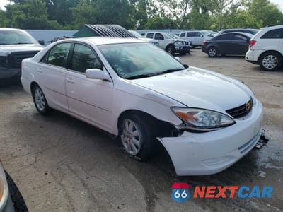 Czwarte zdjęcie samochodu z boku: 2002 TOYOTA CAMRY LE VIN:4T1BE32K32U052725 - miniatura