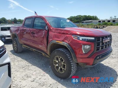 Czwarte zdjęcie samochodu z boku: 2024 GMC CANYON AT4X VIN:1GTP6EEK6R1134054 - miniatura