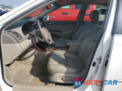 Zdjęcie 7 z 12 samochodu: 2002 TOYOTA CAMRY LE VIN:4T1BE32K32U052725 - miniatura