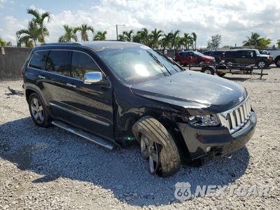 Czwarte zdjęcie samochodu z boku: 2012 JEEP GRAND CHEROKEE OVERLAND VIN:1C4RJECT6CC362781 - miniatura