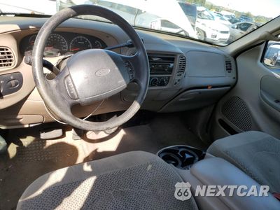 Zdjęcie 8 z 12 samochodu: 2000 FORD F150 VIN:1FTRX17W9YKA49152 - miniatura
