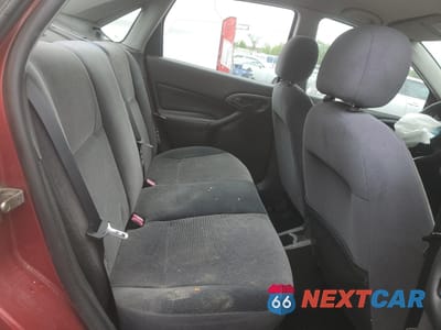 Zdjęcie 10 z 13 samochodu: 2002 FORD FOCUS SE VIN:1FAFP34P12W208201 - miniatura