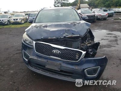 Piąte zdjęcie samochodu w środku: 2016 KIA SORENTO LX VIN:5XYPG4A30GG126373 - miniatura
