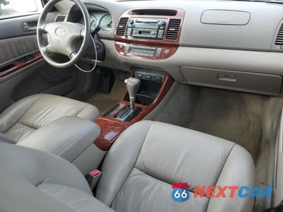 Zdjęcie 8 z 12 samochodu: 2002 TOYOTA CAMRY LE VIN:4T1BE32K32U052725 - miniatura