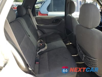 Zdjęcie 11 z 13 samochodu: 2002 FORD ESCAPE VIN:1FMYU03162KB99358 - miniatura