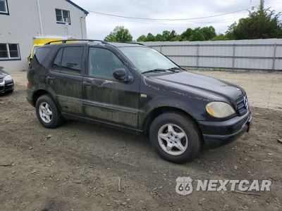 Czwarte zdjęcie samochodu z boku: 2001 MERCEDES-BENZ ML 320 VIN:4JGAB54E71A233494 - miniatura