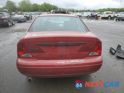 Zdjęcie 6 z 13 samochodu: 2002 FORD FOCUS SE VIN:1FAFP34P12W208201 - miniatura