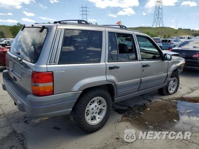 Trzecie zdjęcie samochodu z tyłu: 1998 JEEP GRAND CHEROKEE LAREDO VIN:1J4GZ58Y1WC125392 - miniatura