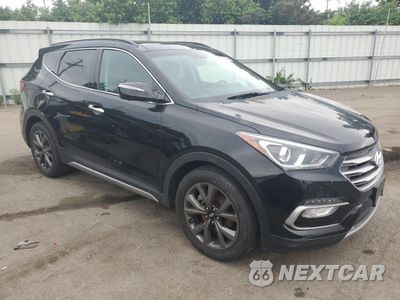 Czwarte zdjęcie samochodu z boku: 2017 HYUNDAI SANTA FE SPORT VIN:5NMZWDLA6HH052004 - miniatura