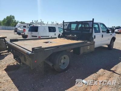 Czwarte zdjęcie samochodu z boku: 2004 FORD F450 SUPER DUTY VIN:1FDXW46P14EC69735 - miniatura