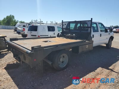 Czwarte zdjęcie samochodu z boku: 2004 FORD F450 SUPER DUTY VIN:1FDXW46P14EC69735 - miniatura