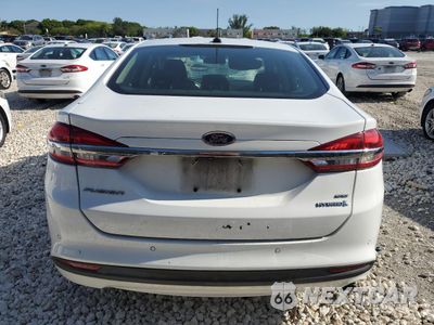 Zdjęcie 6 z 12 samochodu: 2018 FORD FUSION SE HYBRID VIN:3FA6P0LU4JR171992 - miniatura