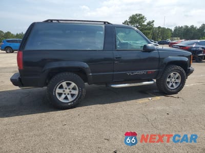 Trzecie zdjęcie samochodu z tyłu: 1994 GMC YUKON VIN:1GKEK18K0RJ732197 - miniatura