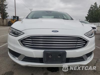 Piąte zdjęcie samochodu w środku: 2018 FORD FUSION SE HYBRID VIN:3FA6P0LU3JR278726 - miniatura