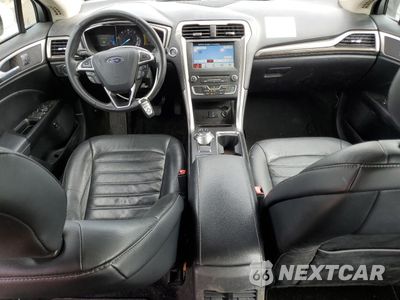 Zdjęcie 8 z 13 samochodu: 2017 FORD FUSION SE HYBRID VIN:3FA6P0LU2HR409591 - miniatura
