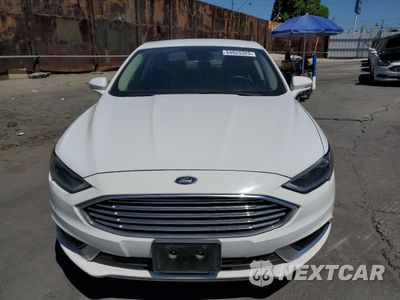 Piąte zdjęcie samochodu w środku: 2018 FORD FUSION SE HYBRID VIN:3FA6P0LU1JR172131 - miniatura