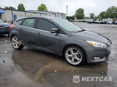 Czwarte zdjęcie samochodu z boku: 2016 FORD FOCUS TITANIUM VIN:1FADP3N24GL303516 - miniatura