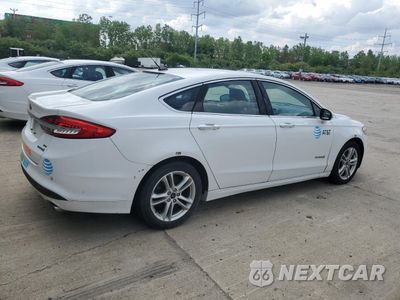 Trzecie zdjęcie samochodu z tyłu: 2018 FORD FUSION SE HYBRID VIN:3FA6P0LU9JR118852 - miniatura