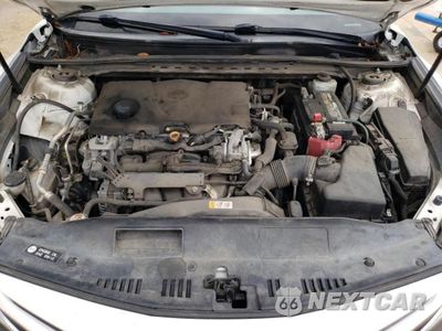 Zdjęcie 11 z 12 samochodu: 2019 TOYOTA CAMRY L VIN:4T1B11HK1KU749673 - miniatura