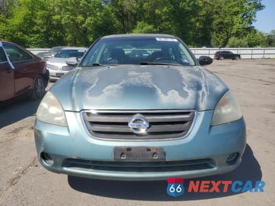 Piąte zdjęcie samochodu w środku: 2002 NISSAN ALTIMA BASE VIN:1N4AL11D62C114854 - miniatura