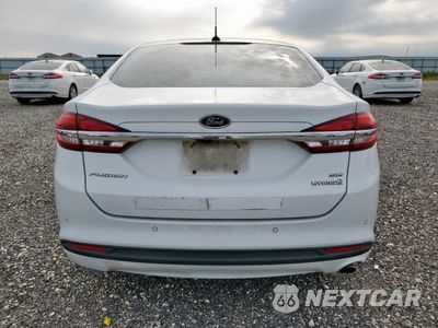 Zdjęcie 6 z 12 samochodu: 2018 FORD FUSION SE HYBRID VIN:3FA6P0LU5JR129816 - miniatura