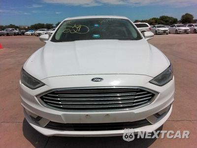 Piąte zdjęcie samochodu w środku: 2017 FORD FUSION SE HYBRID VIN:3FA6P0LUZHR410061 - miniatura