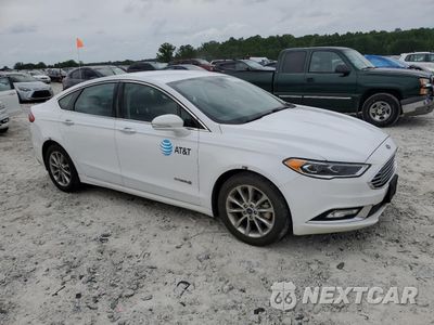 Czwarte zdjęcie samochodu z boku: 2017 FORD FUSION SE HYBRID VIN:3FA6P0LU8HR400734 - miniatura