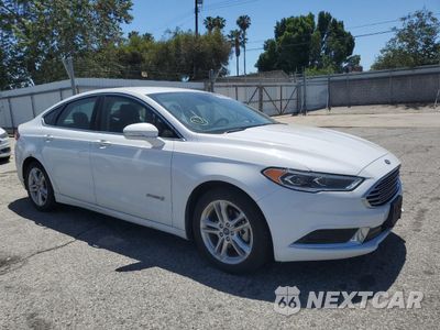 Czwarte zdjęcie samochodu z boku: 2018 FORD FUSION SE HYBRID VIN:3FA6P0LU3JR171806 - miniatura