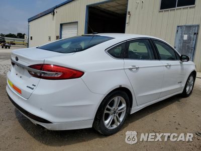 Trzecie zdjęcie samochodu z tyłu: 2018 FORD FUSION SE HYBRID VIN:3FA6P0LU8JR129972 - miniatura