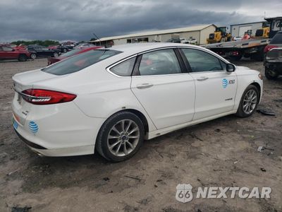 Trzecie zdjęcie samochodu z tyłu: 2017 FORD FUSION SE HYBRID VIN:3FA6P0LU4HR409513 - miniatura