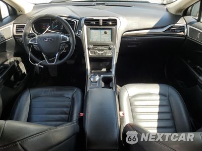 Zdjęcie 8 z 12 samochodu: 2017 FORD FUSION SE HYBRID VIN:3FA6P0LU1HR359542 - miniatura