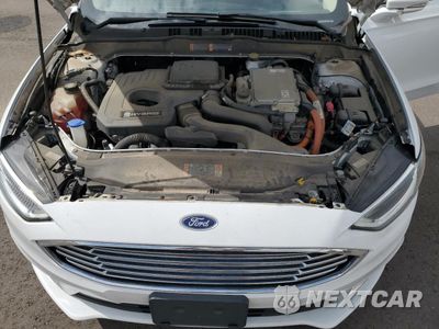 Zdjęcie 11 z 12 samochodu: 2018 FORD FUSION SE HYBRID VIN:3FA6P0LU5JR281904 - miniatura