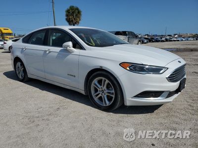 Czwarte zdjęcie samochodu z boku: 2018 FORD FUSION SE HYBRID VIN:3FA6P0LU2JR278703 - miniatura
