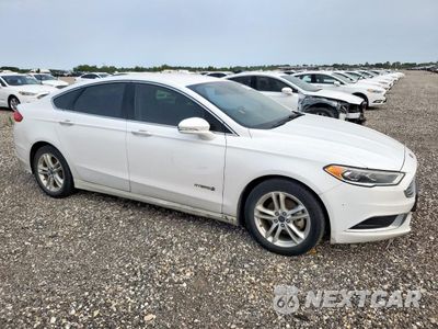 Czwarte zdjęcie samochodu z boku: 2018 FORD FUSION SE HYBRID VIN:3FA6P0LU8JR171638 - miniatura