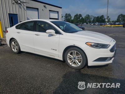 Czwarte zdjęcie samochodu z boku: 2018 FORD FUSION SE HYBRID VIN:3FA6P0LU1JR171724 - miniatura