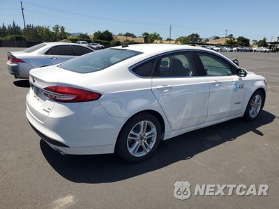 Trzecie zdjęcie samochodu z tyłu: 2018 FORD FUSION SE HYBRID VIN:3FA6P0LU1JR152459 - miniatura