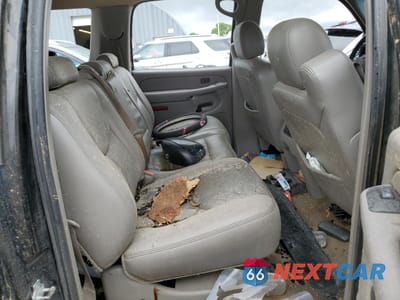 Zdjęcie 11 z 13 samochodu: 2005 GMC YUKON XL K1500 VIN:3GKFK16Z45G292856 - miniatura