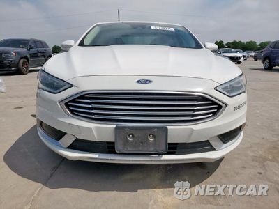 Piąte zdjęcie samochodu w środku: 2018 FORD FUSION SE HYBRID VIN:3FA6P0LU4JR118659 - miniatura