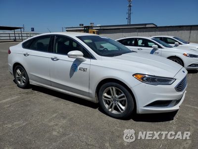 Czwarte zdjęcie samochodu z boku: 2018 FORD FUSION SE HYBRID VIN:3FA6P0LU1JR171545 - miniatura