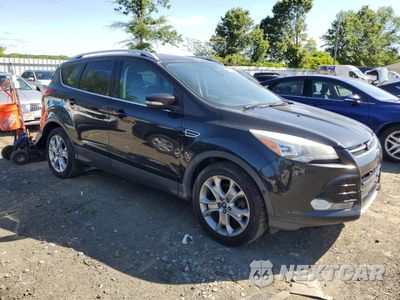Czwarte zdjęcie samochodu z boku: 2014 FORD ESCAPE TITANIUM VIN:1FMCU9JXXEUB21406 - miniatura